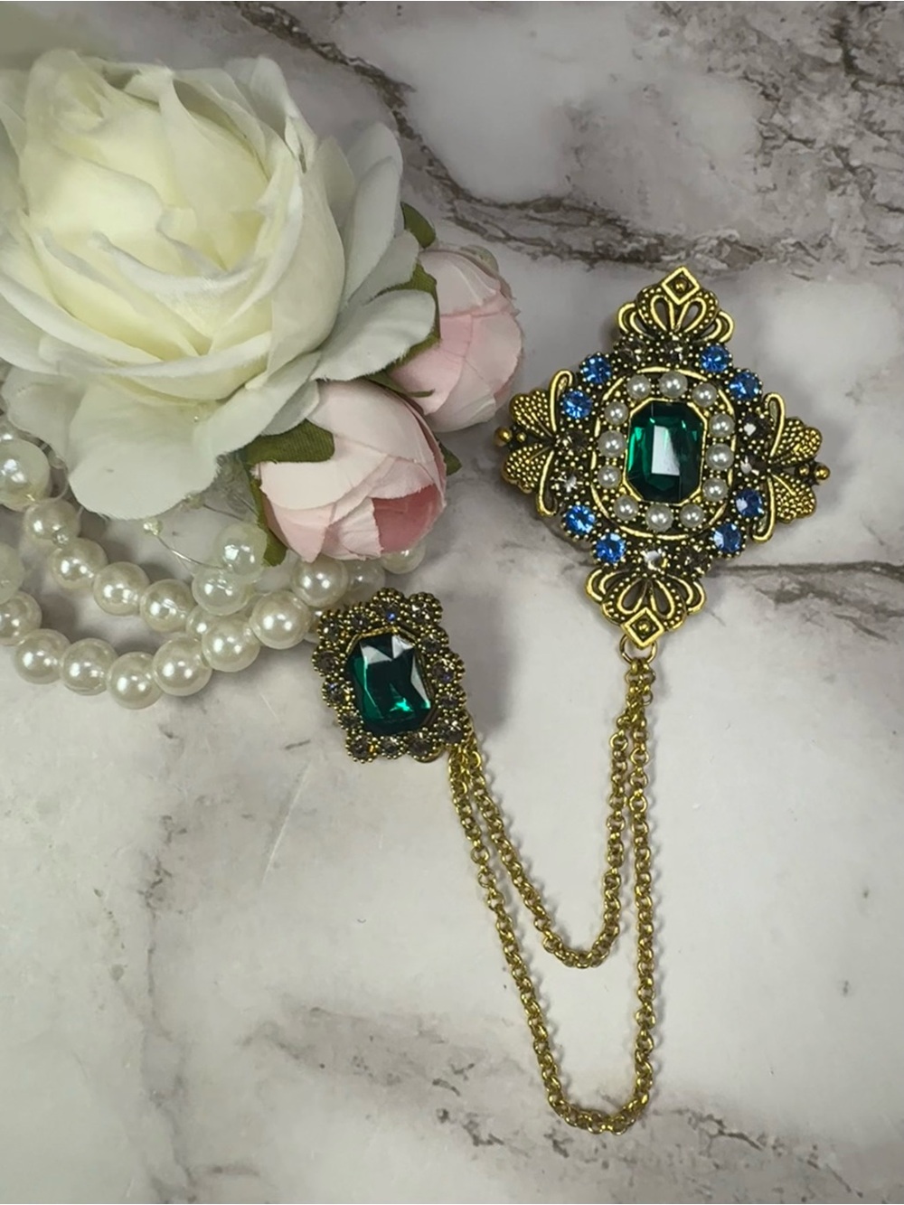 Vintage-Inspired Gold Chain Brooch with Emerald and Blue Accents